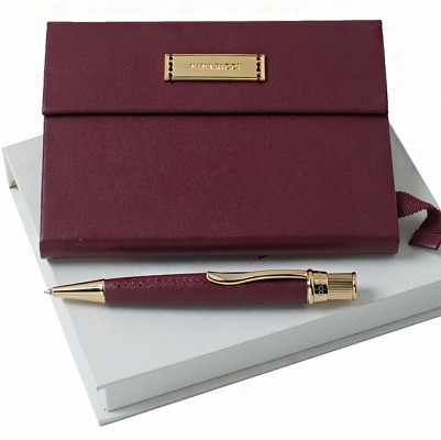Set de carnetel A6 visiniu cu pix Nina Ricci - RPBN407 RPBN407 seturi de cadou Nina Ricci carnetel cu pix de lux